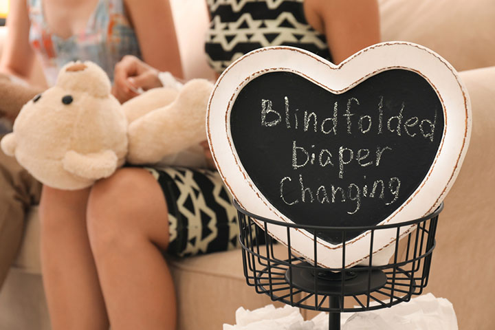 Blindfold diaper changing for baby shower games