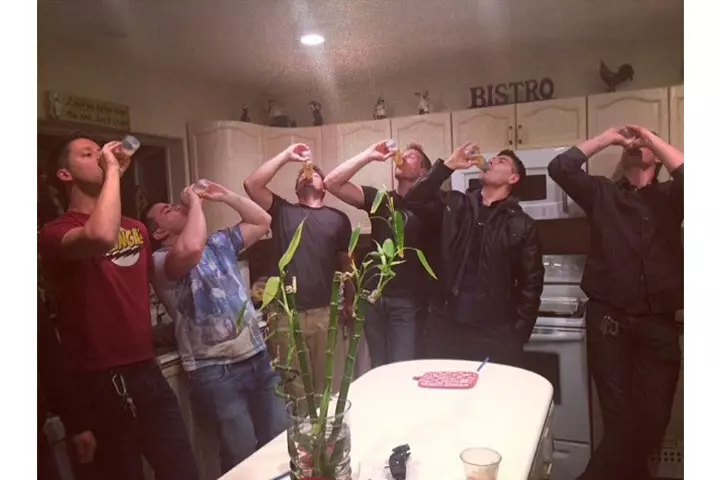 Baby bottle chugging for baby shower games