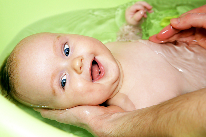 You can also give the baby a warm bath to soothe stomach muscles 