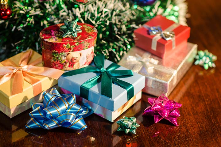 Gift wrap relay race Christmas game for kids