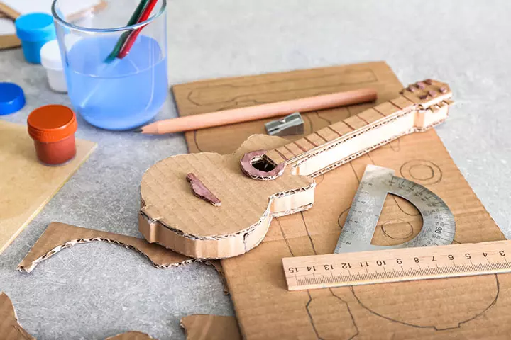 cardboard guitar, cardboard box crafts for kids