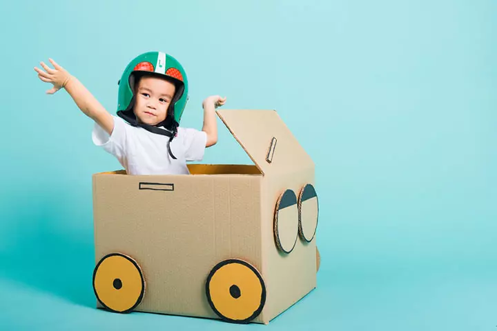 kid driving a play car, cardboard box crafts for kids