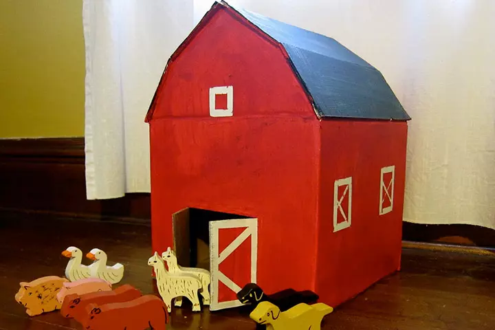 Red cardboard barn carboard box crafts for kids
