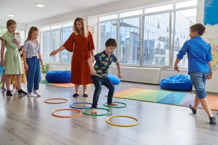 Running through hula hoops superhero activities for kids