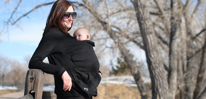 A hooded baby carrier is just perfect to take your baby out on a cold morning.