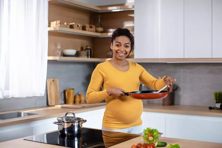 Cook bacon over a stove to kill the bacteria completely.