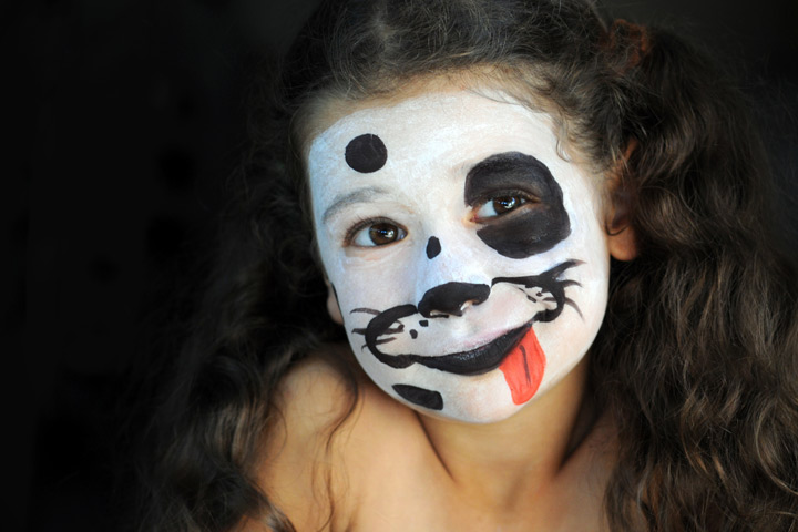 Dalmatian dog face painting idea for kids