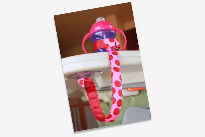 The sippy-cup leash is a great way to keep the cup latched instead of dropping off to the ground every time.