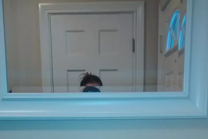 When a tall husband hangs mirror for a short wife