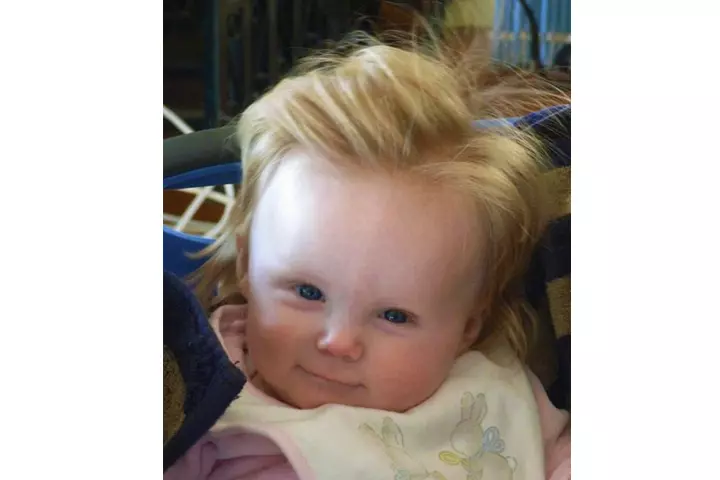 This kiddo could be the next Presidential candidate with that hairstyle