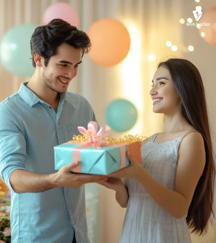 A Men Giving Birthday Surprise To Her Wife