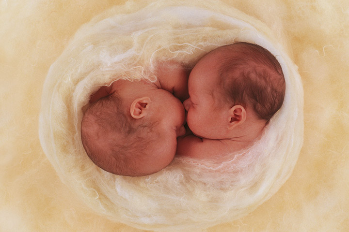 The cocooned babies radiate the feeling of warmth.