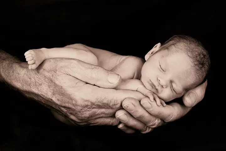 Yes, it's not always mamas, dads too love to hold their babies.