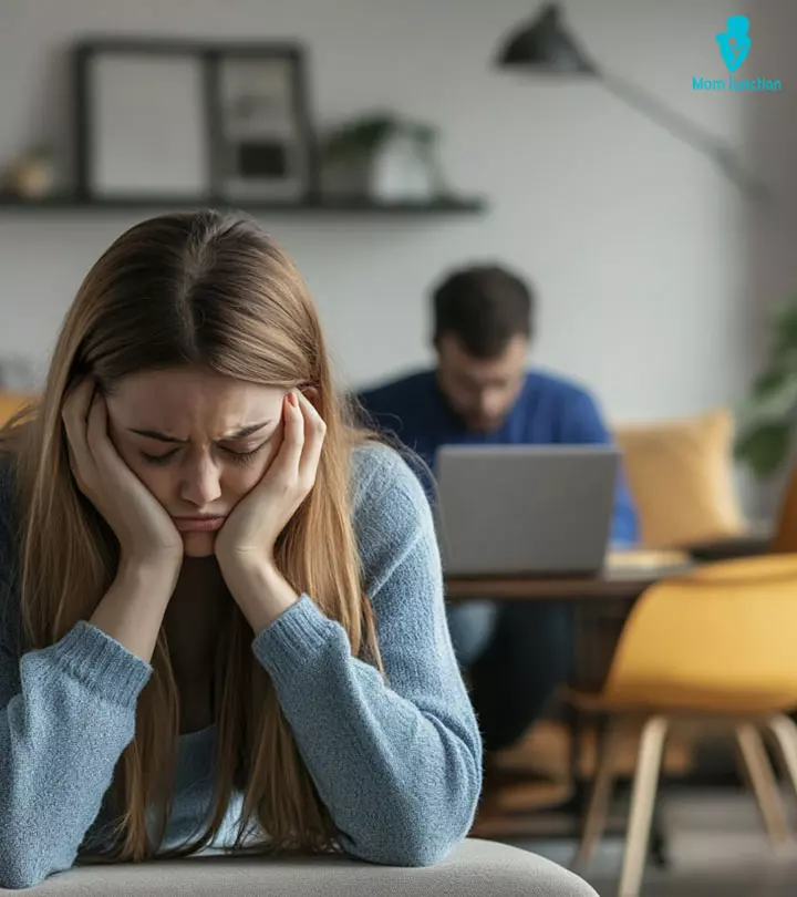 Woman Looking At Her Emotionally Unavailable Husband