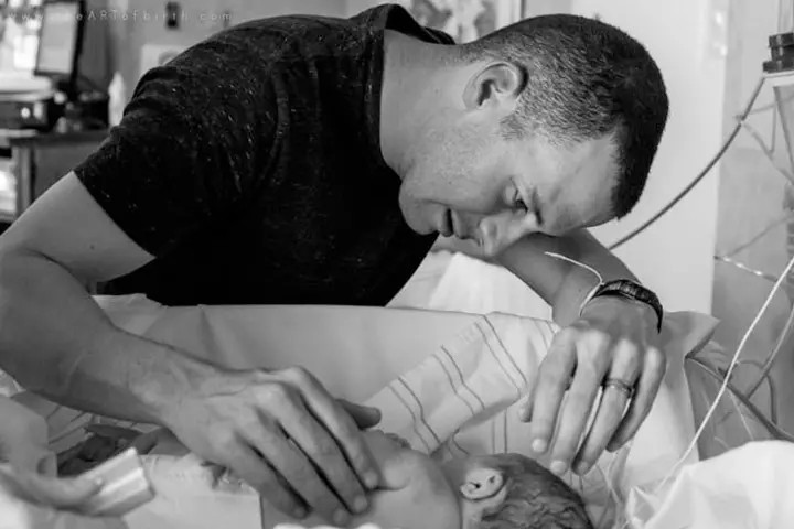 I can't help but gush at the delicacy with which he handles his child!