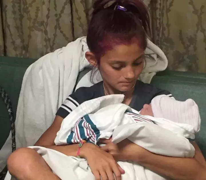 Jacee finally gets to hold the little one in her arms. Jacee finally gets to hold the little one in her arms.