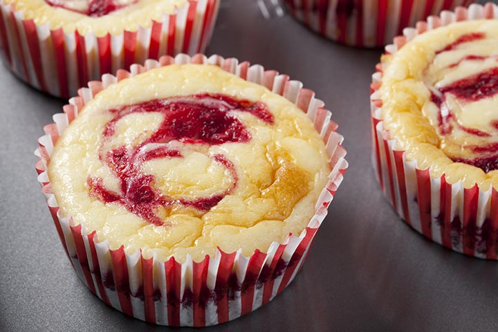Raspberry swirled cheesecake cupcakes for baby shower desserts
