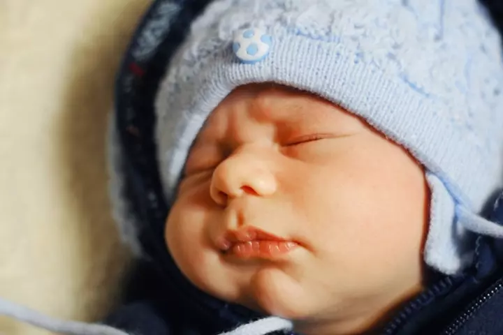 Covering The Baby With Blankets During A Fever