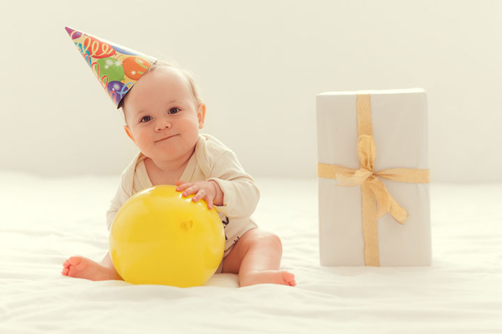 Happy baby playing 1st birthday invitation wordings