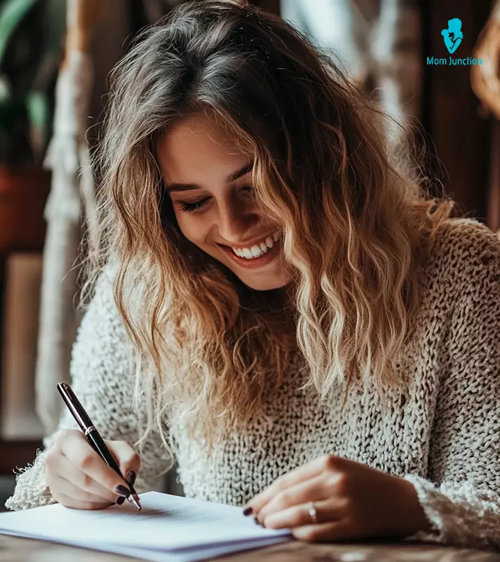 Women writing a letter to her husband