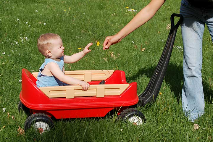 A ride on the wagon as first birthday party games ideas