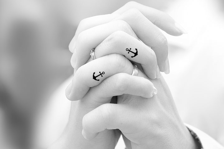 Anchor tattoos for couples on finger