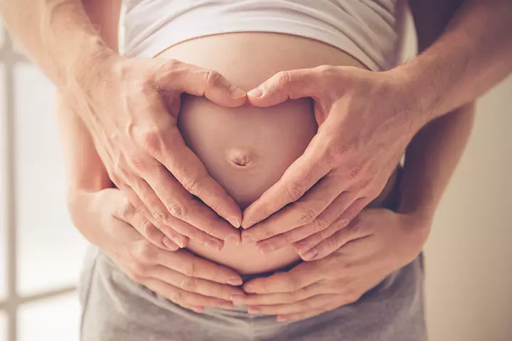 Heart hands maternity photoshoot idea