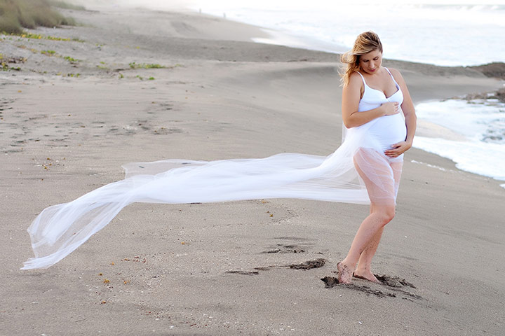 Silky drapes maternity photoshoot idea