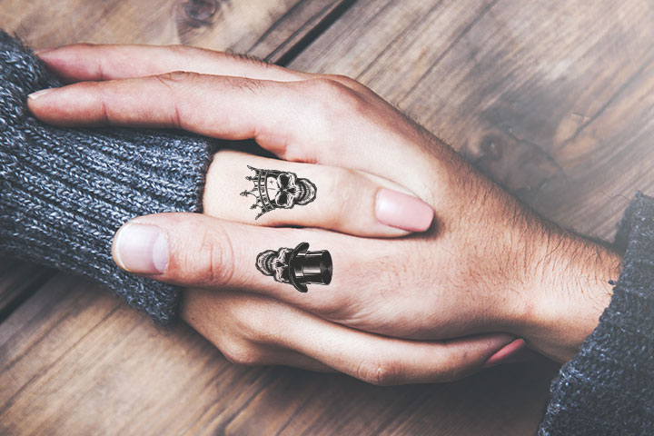 Skull tattoos for couples on fingers