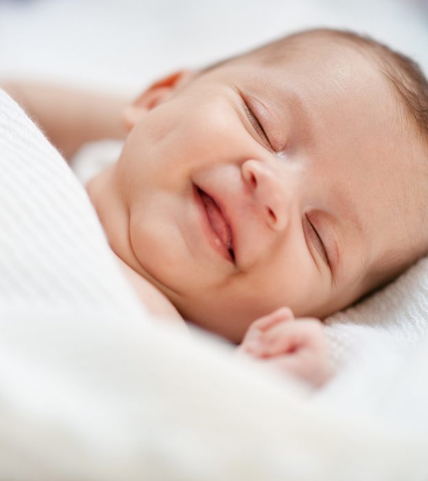 Why Do Babies Smile In Their Sleep?