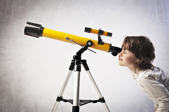 kid with telescope