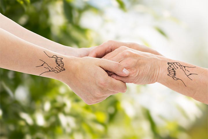 Intertwined Hands Tattoo