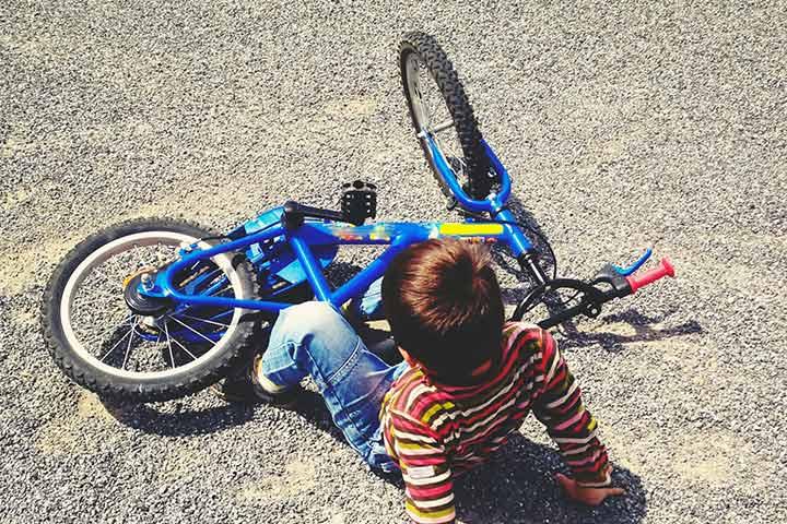 Riding A Bicycle Without Helmet