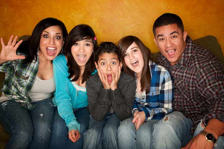 Silly poses and expressions family photo idea