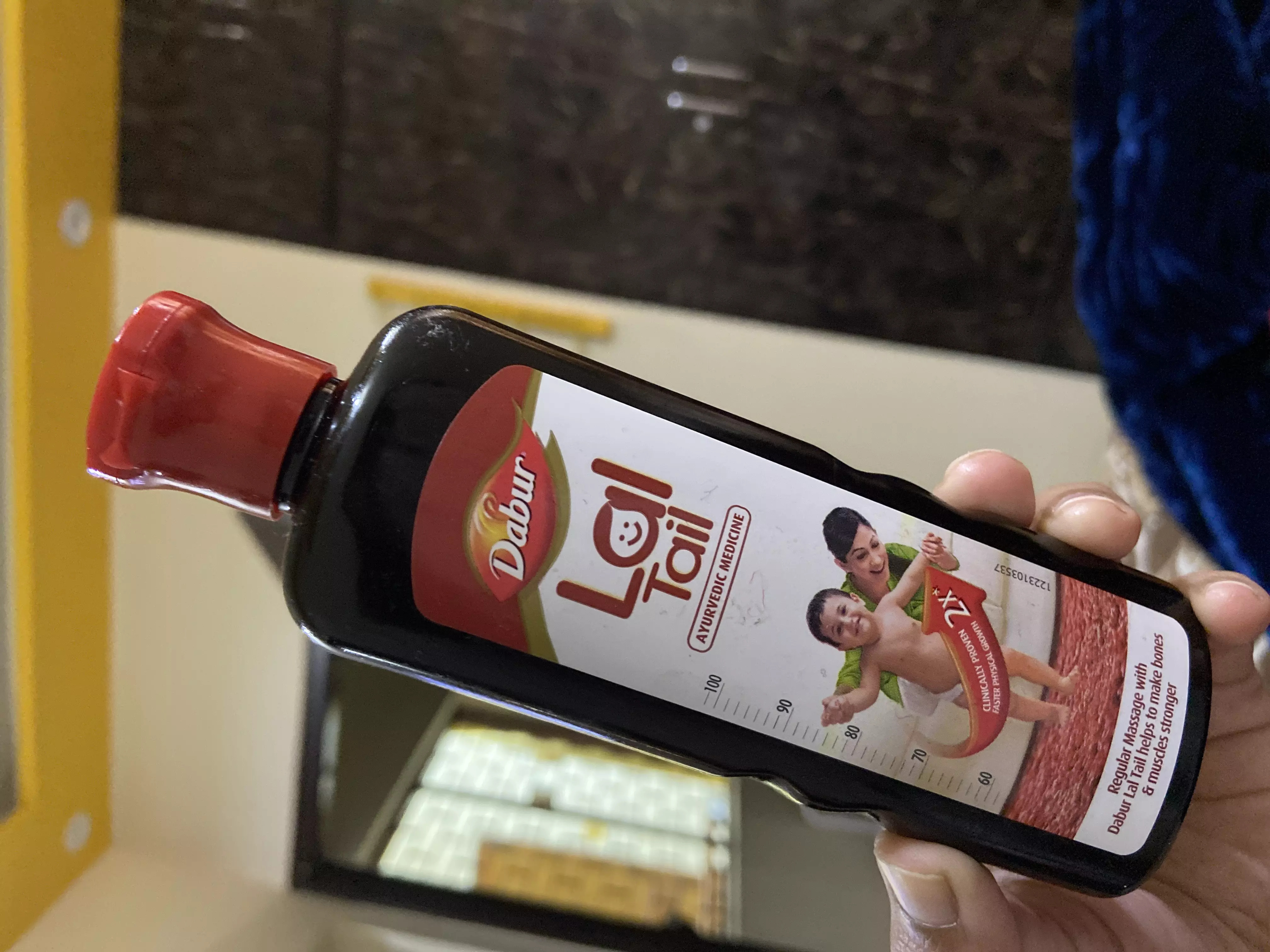 dabur lal tel malish