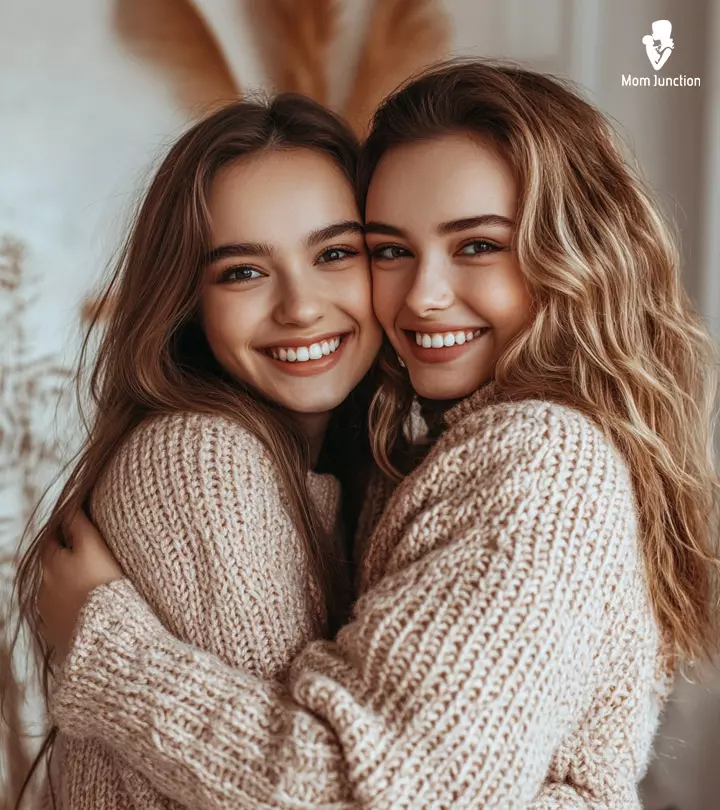 Two sisters hugging each other