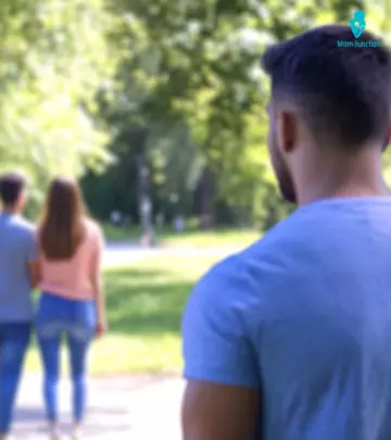 Man Feeling Sad As Woman Walks Away