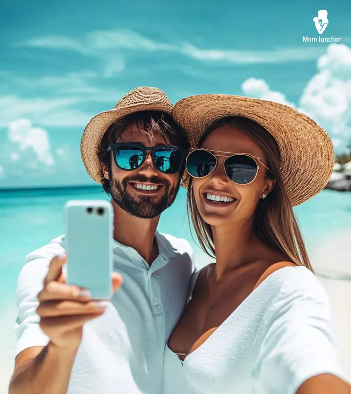 A Couple Taking Selfie In Car