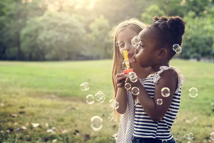 DIY bubble wand activity with kitchen utensils for 7-year-olds