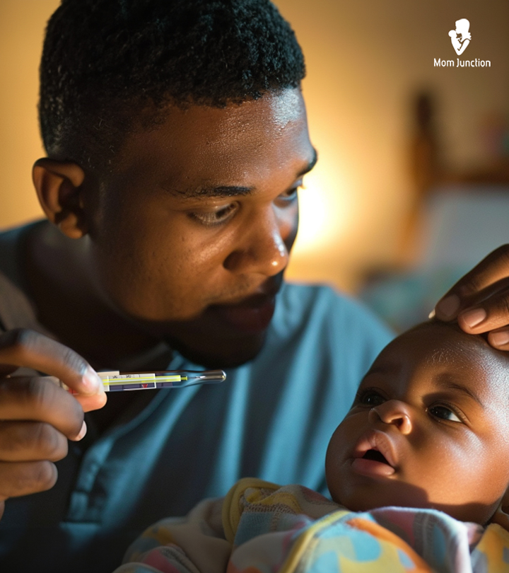 A person checking a baby's temperature