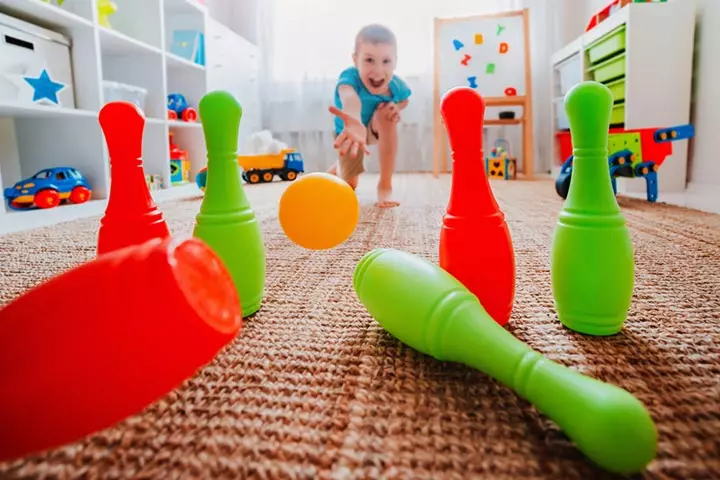 Bowling with plastic cups, a traditional babysitting game