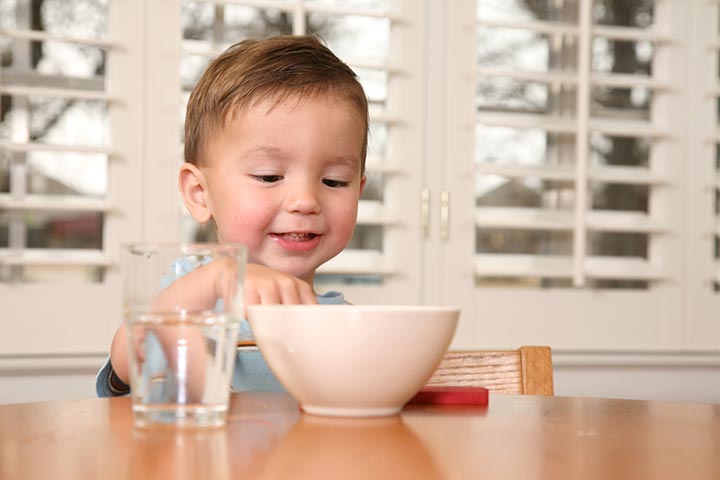 Encourage them to pour water from one bowl to the other.