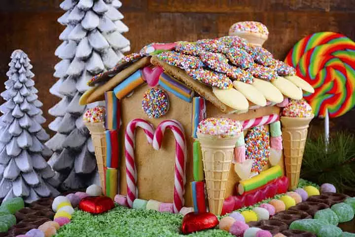 Gingerbread House Decorated With Candy Canes And Marshmallow Cones
