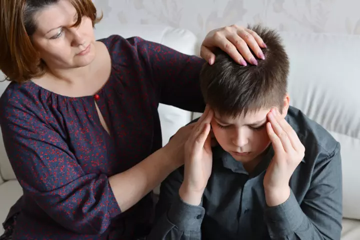 Kid may experience headache due to herpes