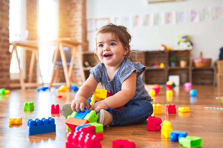 When Do Babies Start Holding & Playing With Toys?