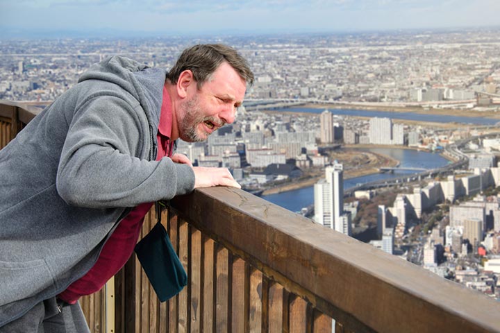 Man suffering from acrophobia