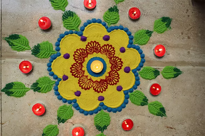 Flower and diya rangoli design