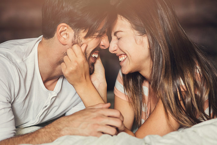 Pinching cheeks and smiling couple photo pose ideas