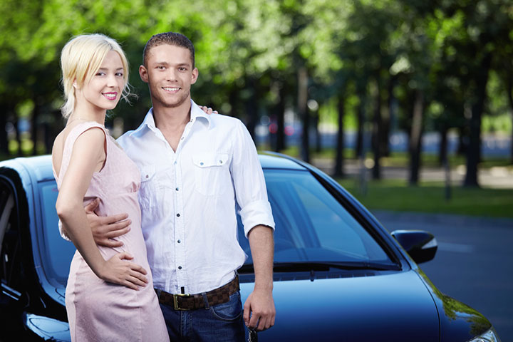 Stylish black couple near car · Free Stock Photo