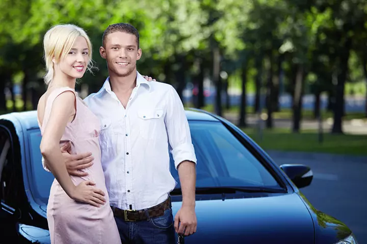 The attractive pose with a car